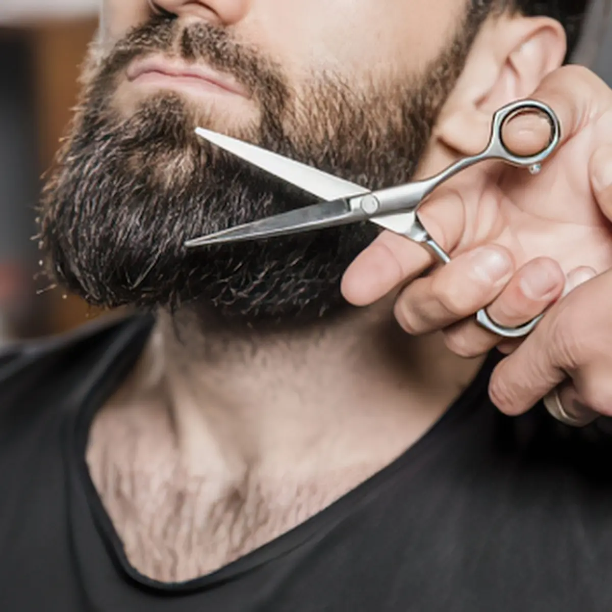 Beard trimming and styling at Angel's Touch salon